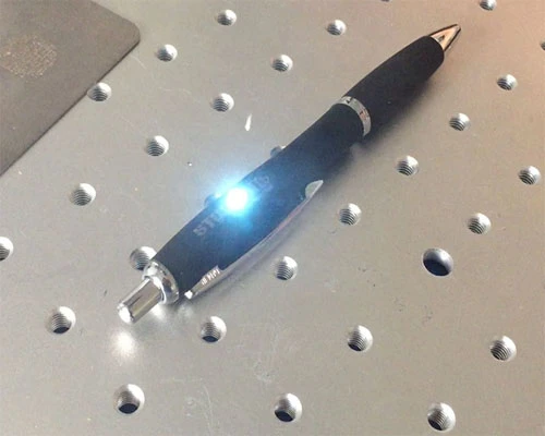Laser manufacturing on outer of pen